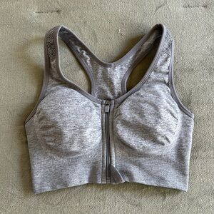 Gray padded front zip sports bra